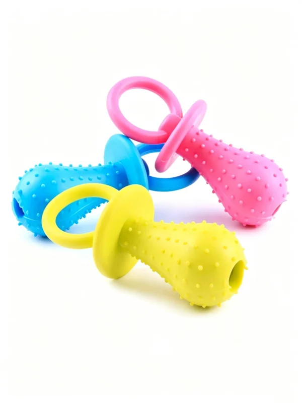 Pacifier-shaped toy with a bell