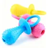 Pacifier-shaped toy with a bell