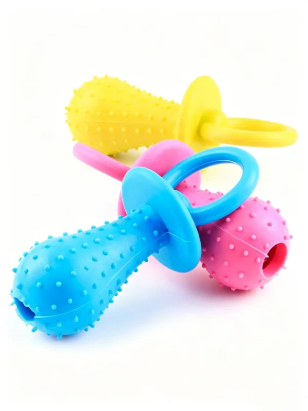 Pacifier-shaped toy with a bell