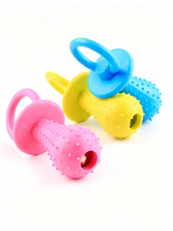 Pacifier-shaped toy with a bell