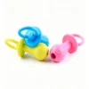 Pacifier-shaped toy with a bell
